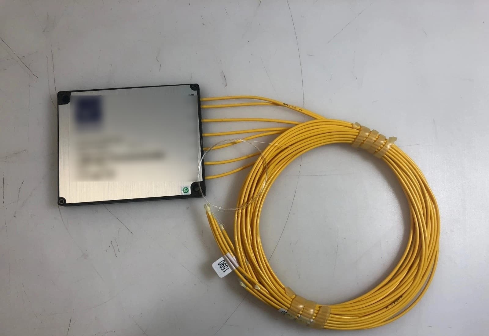 5-units min. CommScope OP94M5H100R100  Op94m5h100r100 Multiplexer For 5 Cwdm Channels In A Field Hardened Enclosure, Multiplexes 1530, 1550, 1570, 1590 And 1610 Nm Into A Single Output, With Expansion Port, 1 Meter Pigtail Of .900 Tight Buffered Fiber With No Connectors. - OP94M5H-1-00-R1-00